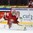 HELSINKI, FINLAND - JANUARY 2: Belarus' Ivan Kulbakov #31 turns as Team Switzerland scores a second period goal with Belarus' Grigori Veremyov #15 in front during relegation round action at the 2016 IIHF World Junior Championship. (Photo by Matt Zambonin/HHOF-IIHF Images)


